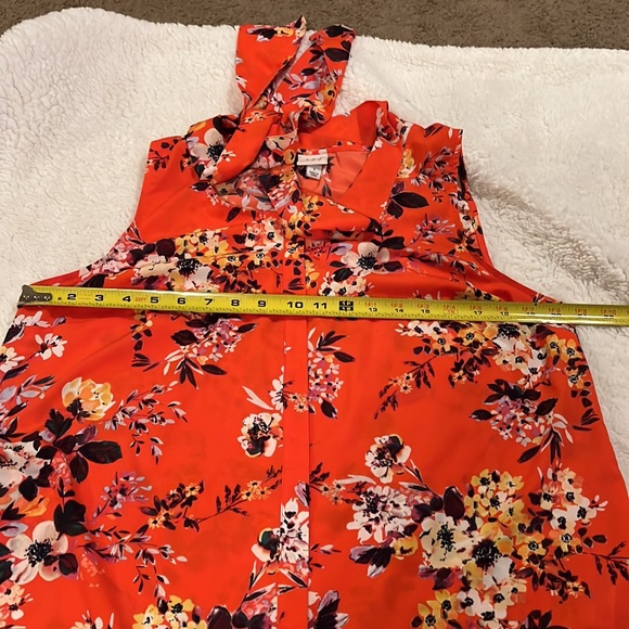 a new day sleeveless button down blouse
Size: Large
Color: Orange/Red - Picture 15 of 16